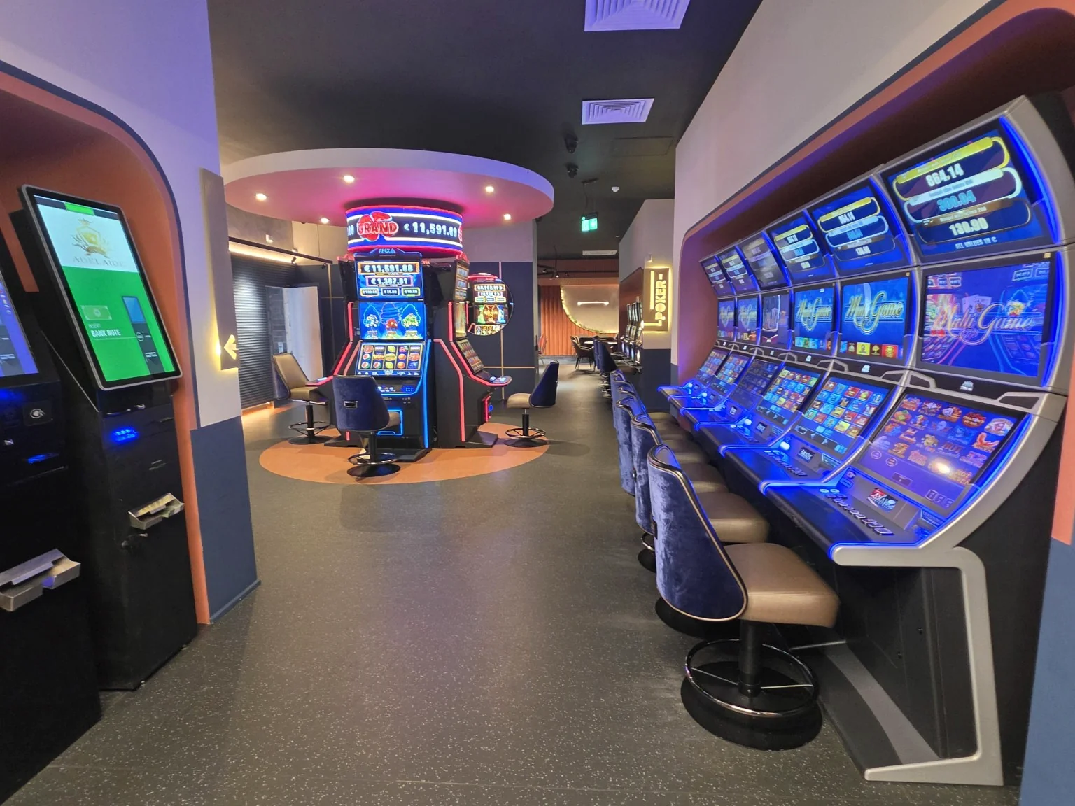 Modern refurbished Adelaide gaming floor featuring rows of illuminated machines